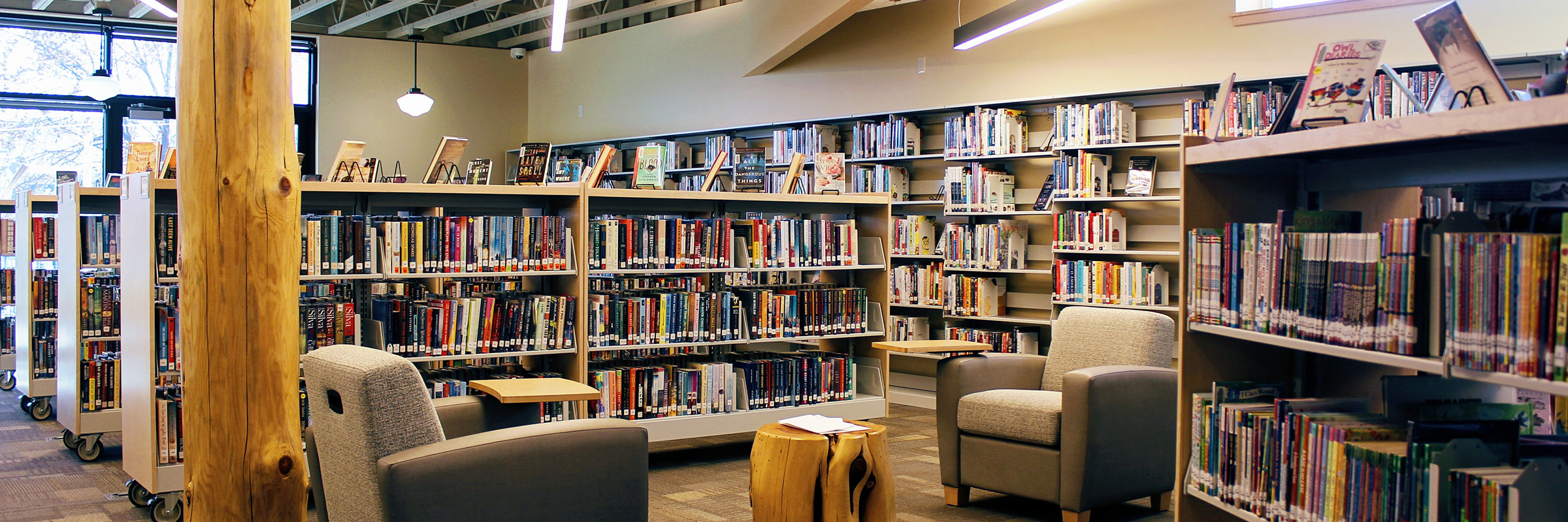 Seating area and shelving inside the Southern Wasco County Library