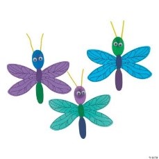 Picture of brightly colored dragonfly spoon craft on white background.