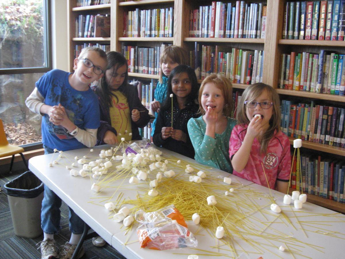 Building a tower, using marshmallows and spaghetti noodles